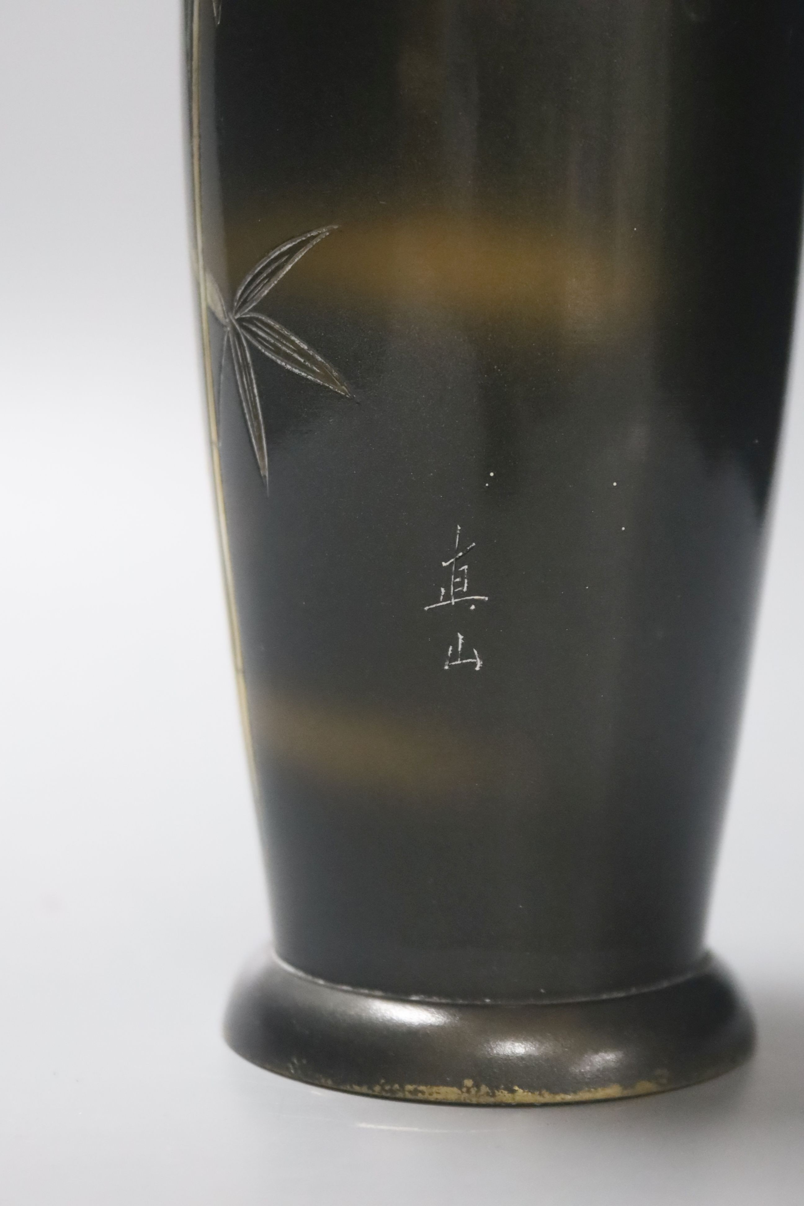 An early 20th century Japanese patinated bronze ‘bamboo’ vase, 18cm, wood stand